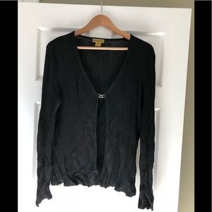 Moments cardigan clasp closure. Deep black color.